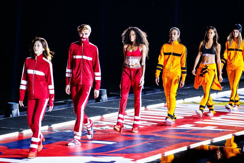 SHANGHAI CHINA SEPTEMBER 04 Actress Maggie Jiang Shuying and Canadian model Winnie Harlow walk the runway during...