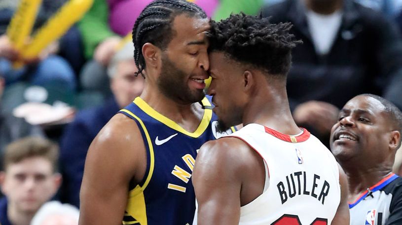 INDIANAPOLIS INDIANA JANUARY 08 Jimmy Butler 22 of the Miami Heat and T.J. Warren 1 of the Indiana Pacers get...