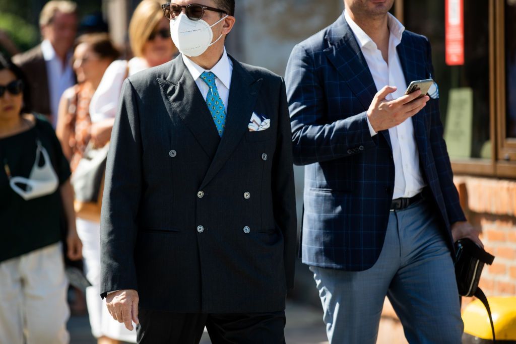 FLORENCE ITALY JUNE 15 A guest is seen wearing black double breasted suit at the Pitti Immagine Uomo 102 at Fortezza Da...