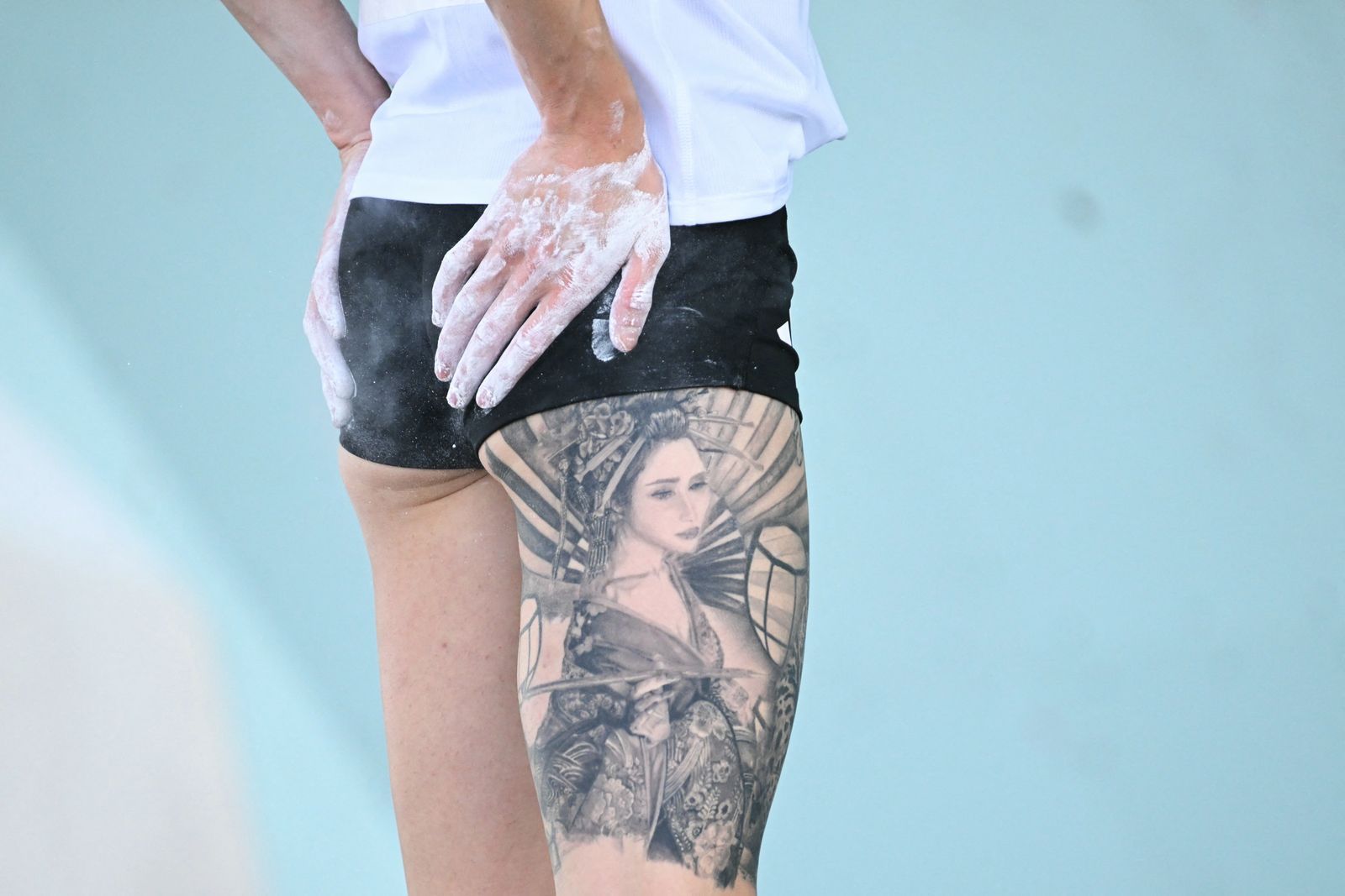 This photograph shows a tatoo of Slovenia's Mia Krampl as she competes in the women's sport climbing boulder semi final...