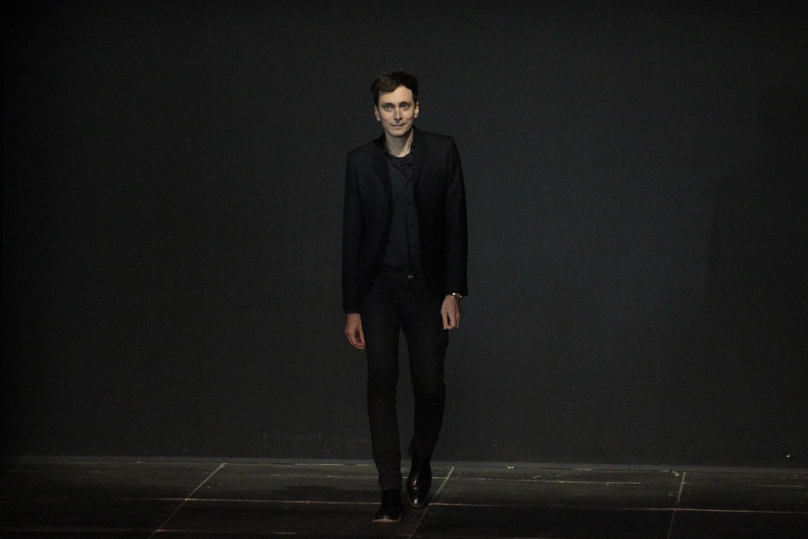 PARIS FRANCE OCTOBER 01 Hedi Slimane walks the runway during the Saint Laurent Spring Summer 2013 show as part of...