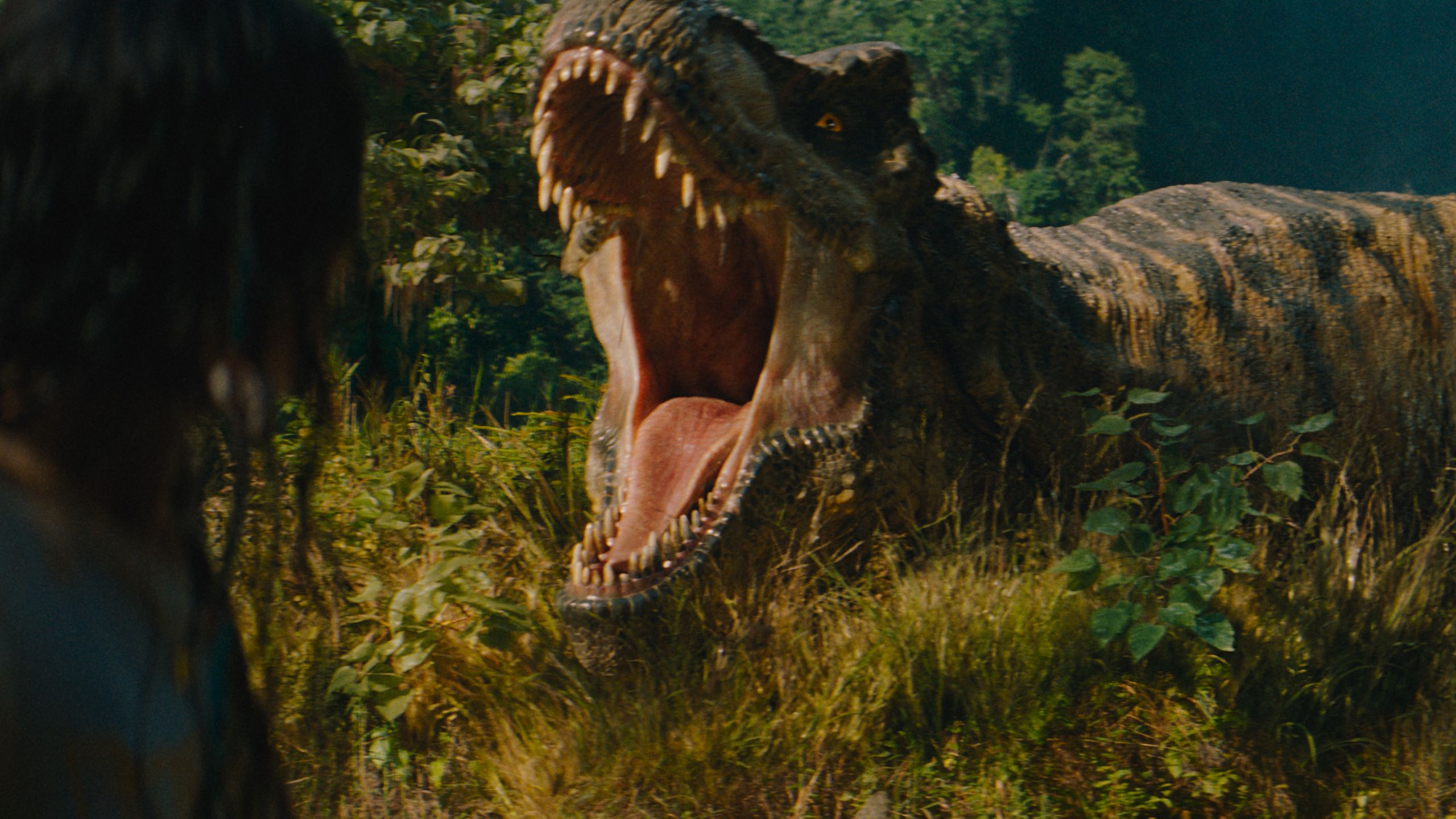 L to R Luna Blaise and the TRex in JURASSIC WORLD REBIRTH directed by Gareth Edwards