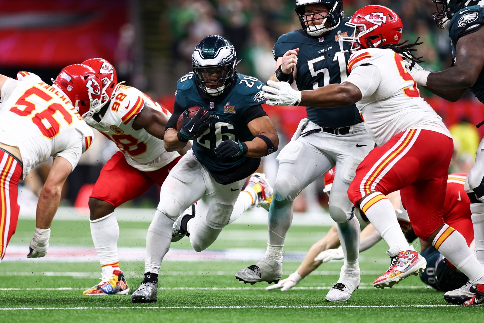 NEW ORLEANS LOUISIANA FEBRUARY 9 Saquon Barkley 26 of the Philadelphia Eagles carries the ball against the Kansas City...