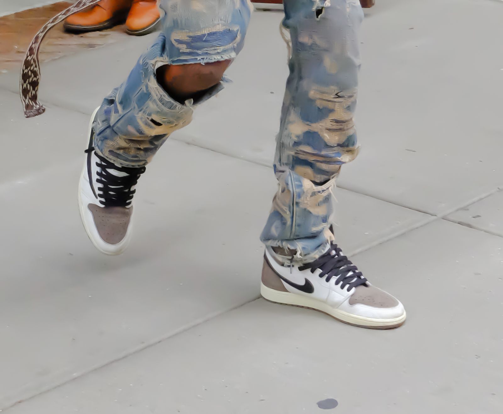 NEW YORK NY JULY 08 Travis Scott shoe detail is seen in walking out of a hotel in SoHo on July 8 2021 in New York City.