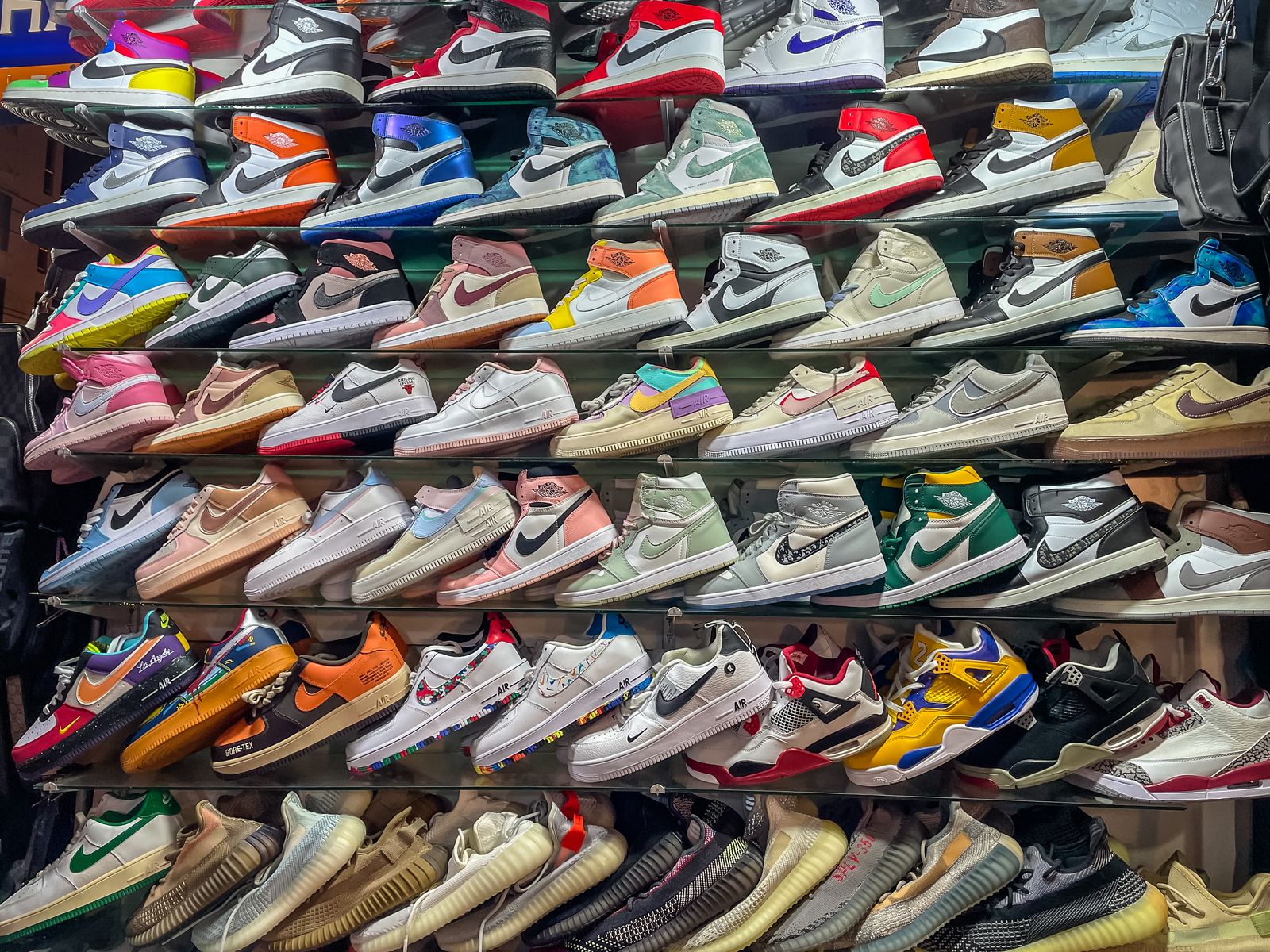 Phuket Thailand May 4 2022 Rows of Counterfeit Fake Poor quality Trainers such as Nike Air Jordans and Adidas being...