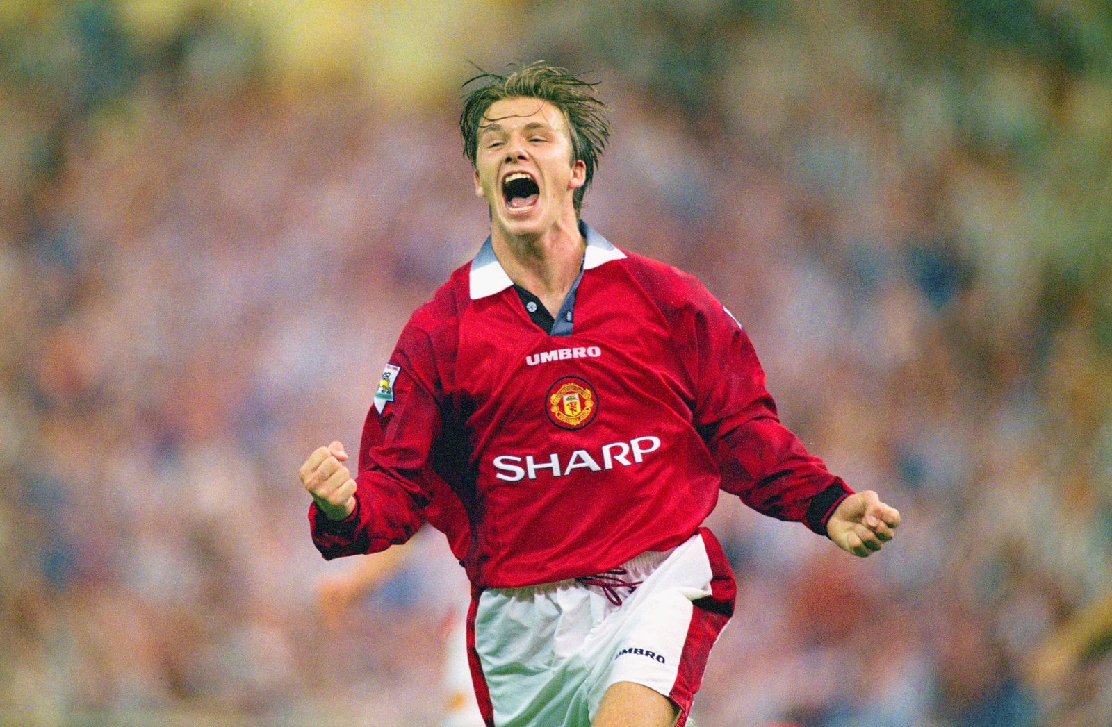LONDON UNITED KINGDOM AUGUST 11 David Beckham of Manchester United celebrates after scoring the third goal in the 1996...