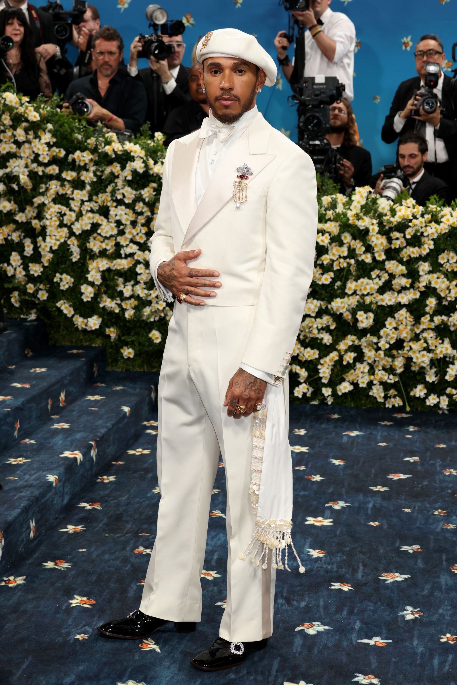 NEW YORK NEW YORK MAY 05 Met Gala CoChair Lewis Hamilton attends the 2025 Met Gala Celebrating Superfine Tailoring...
