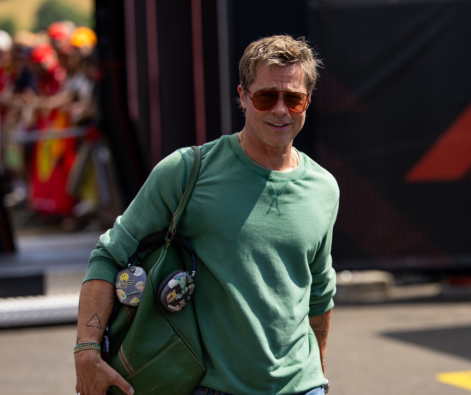 BUDAPEST HUNGARY JULY 19 American actor Brad Pitt walks in the paddock during practice ahead of the F1 Grand Prix of...