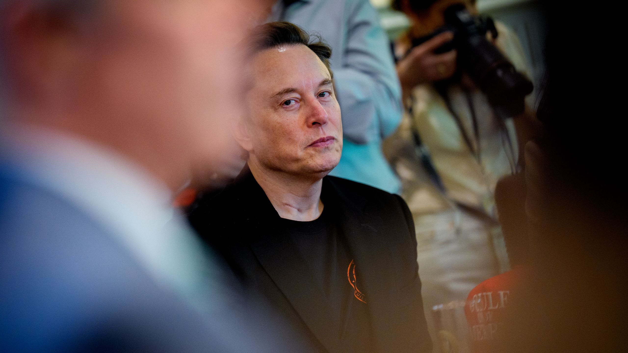 WASHINGTON DC APRIL 30 Tesla CEO Elon Musk looks on during a Cabinet meeting at the White House on April 30 2025 in...