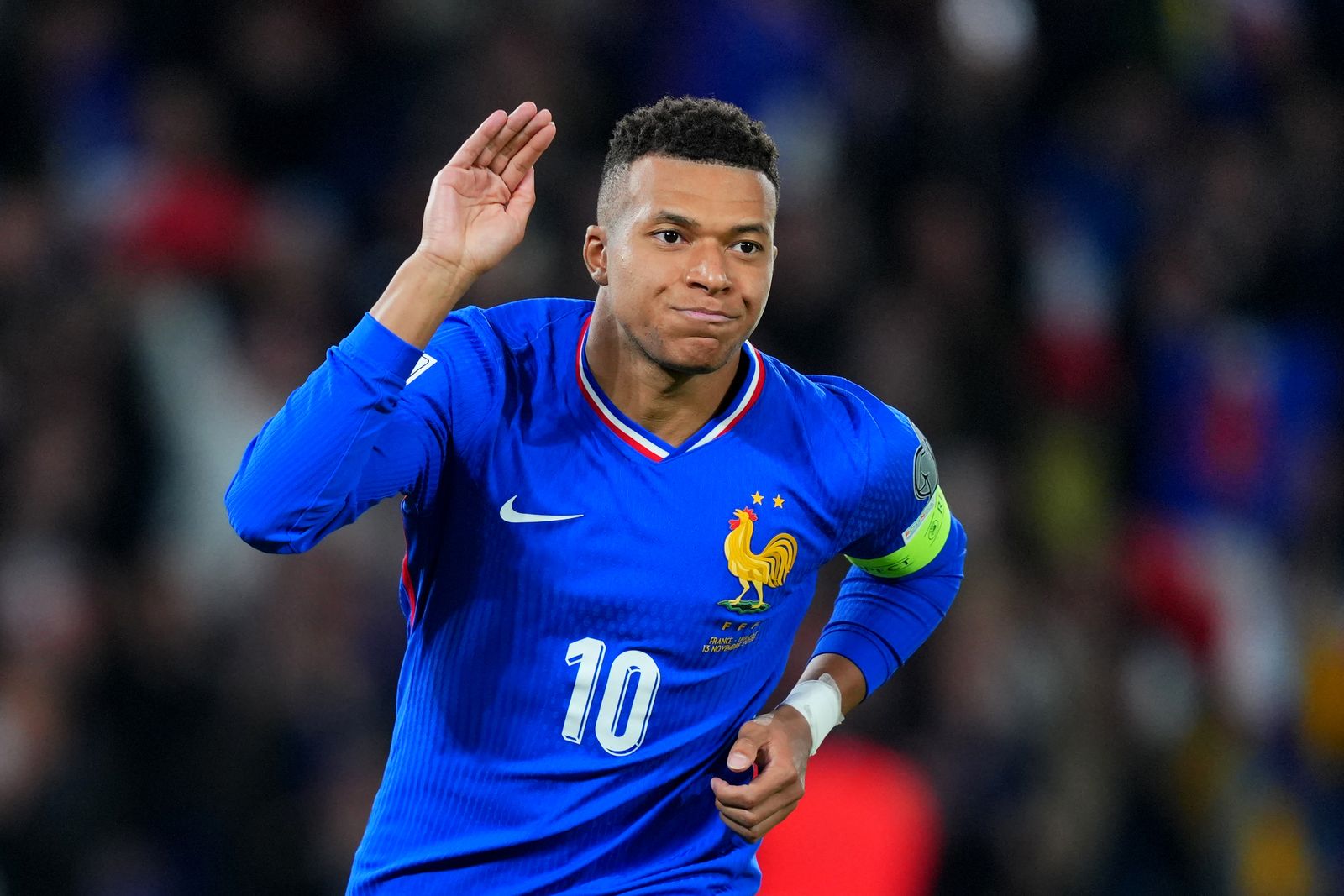 PARIS FRANCE NOVEMBER 13 Kylian Mbappe of France celebrates scoring his team's first goal from the penalty spot during...