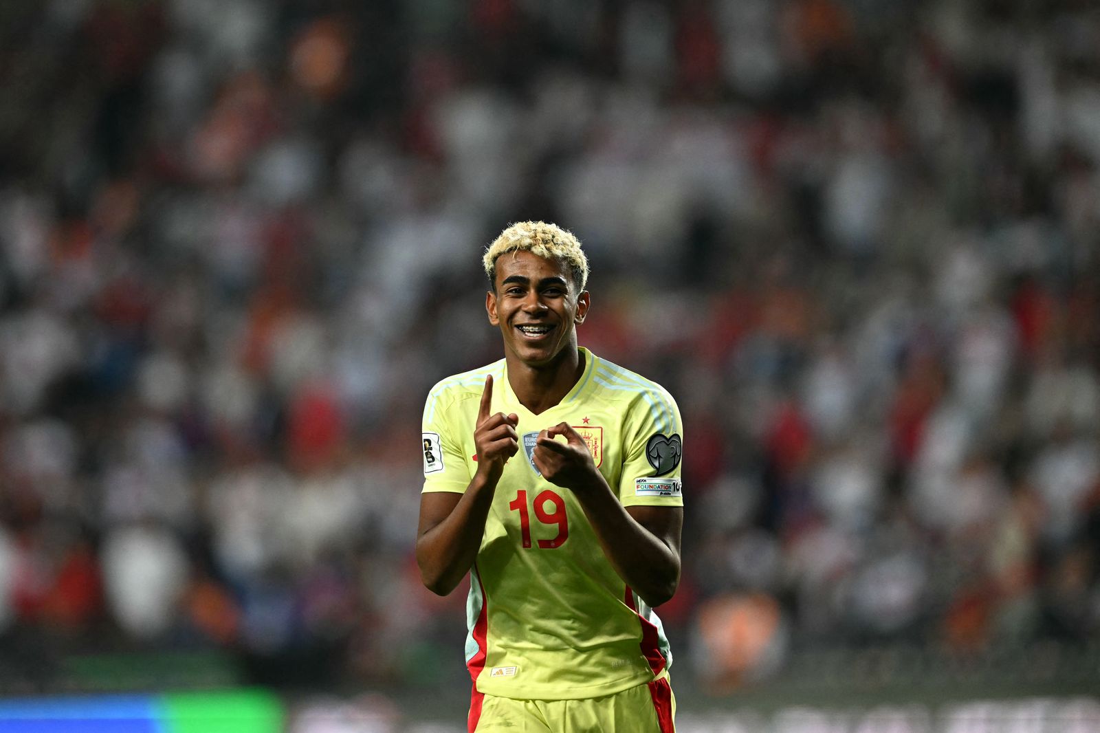 Spain's forward 19 Lamine Yamal celebrates after Spain score their fourth goal during the FIFA World Cup 2026 Group E...