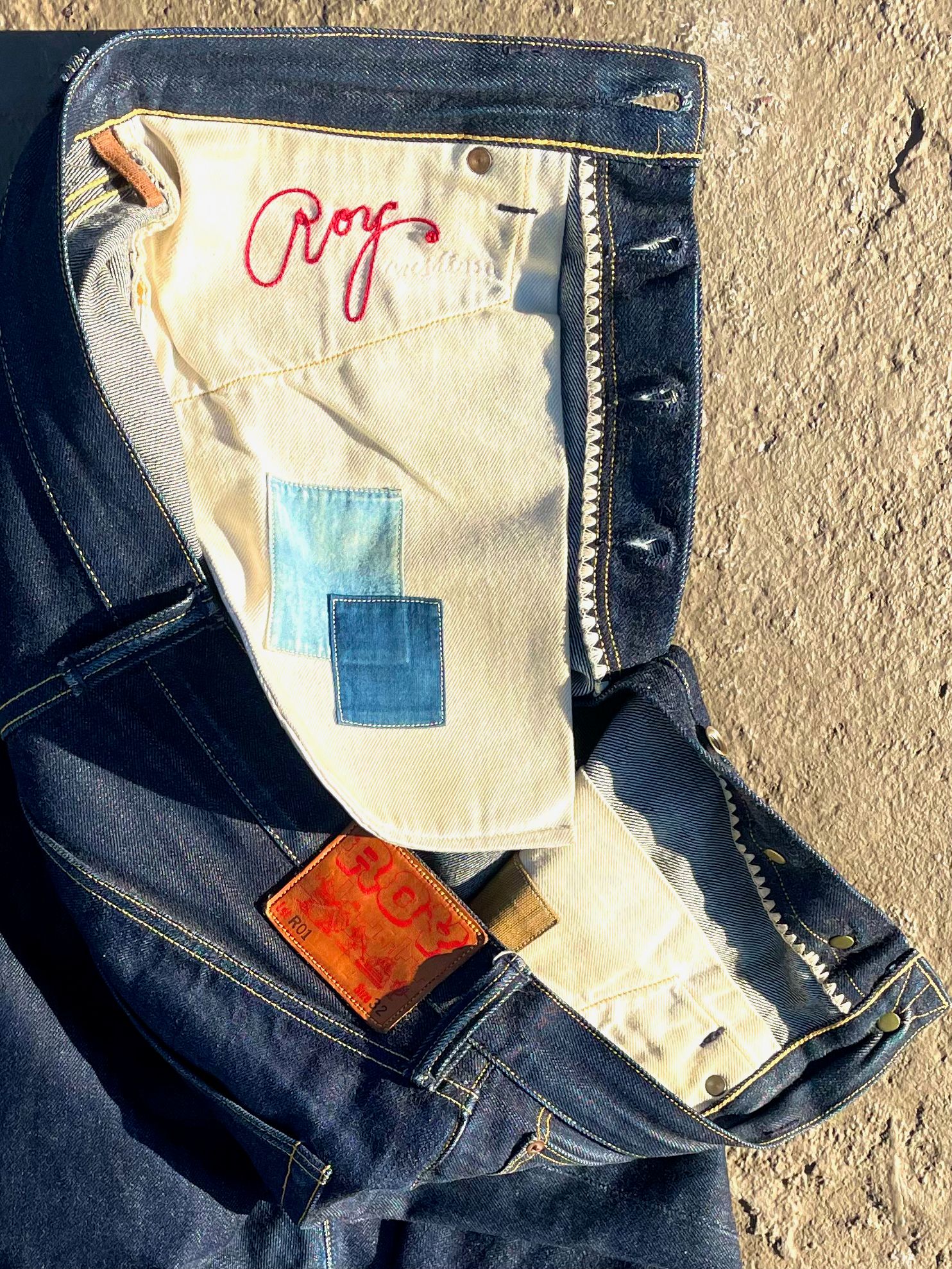 Image may contain Clothing Pants Jeans Accessories and Wallet