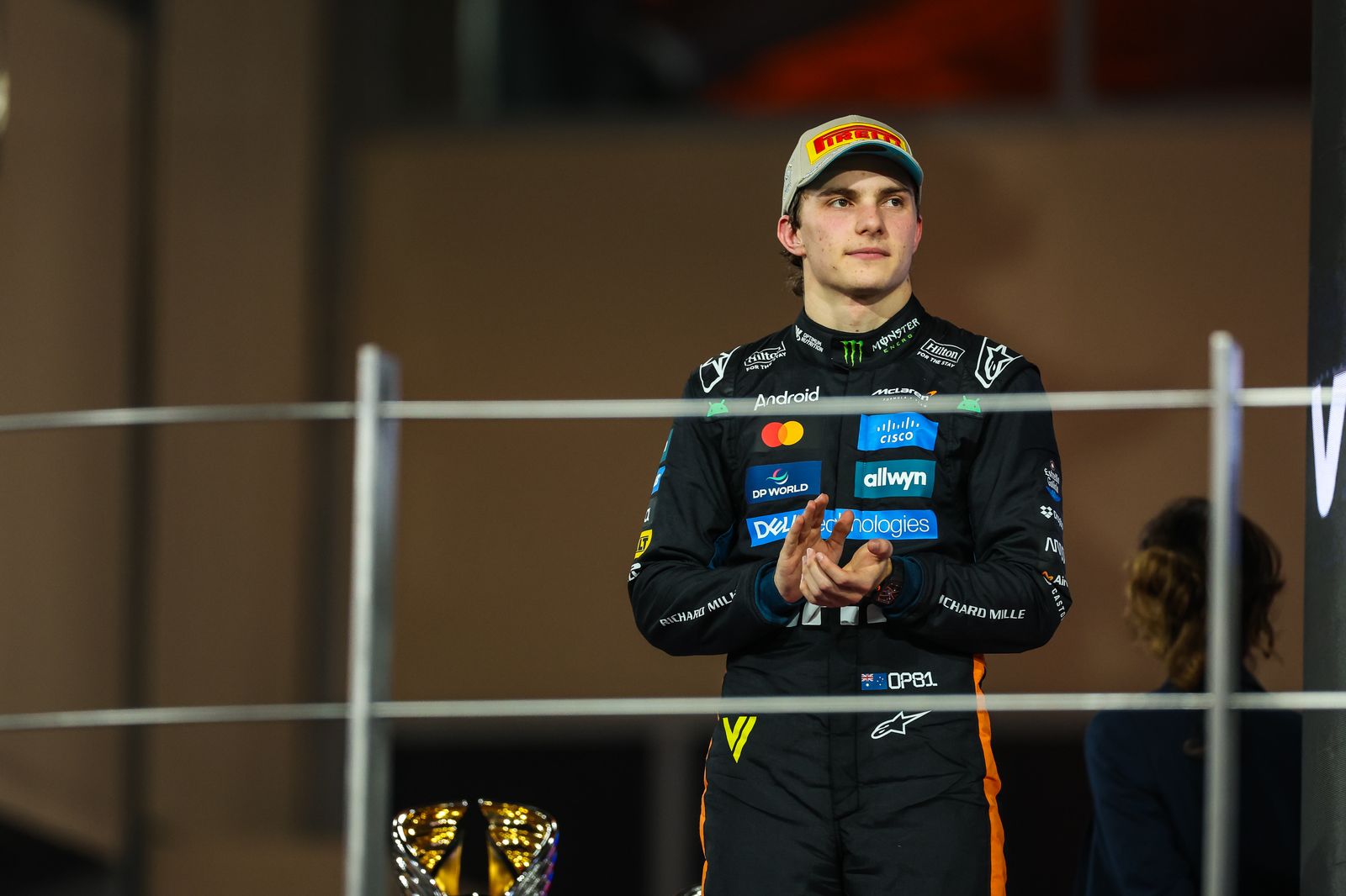ABU DHABI UNITED ARAB EMIRATES DECEMBER 7 Oscar Piastri of Australia and McLaren looks on on the podium during the F1...