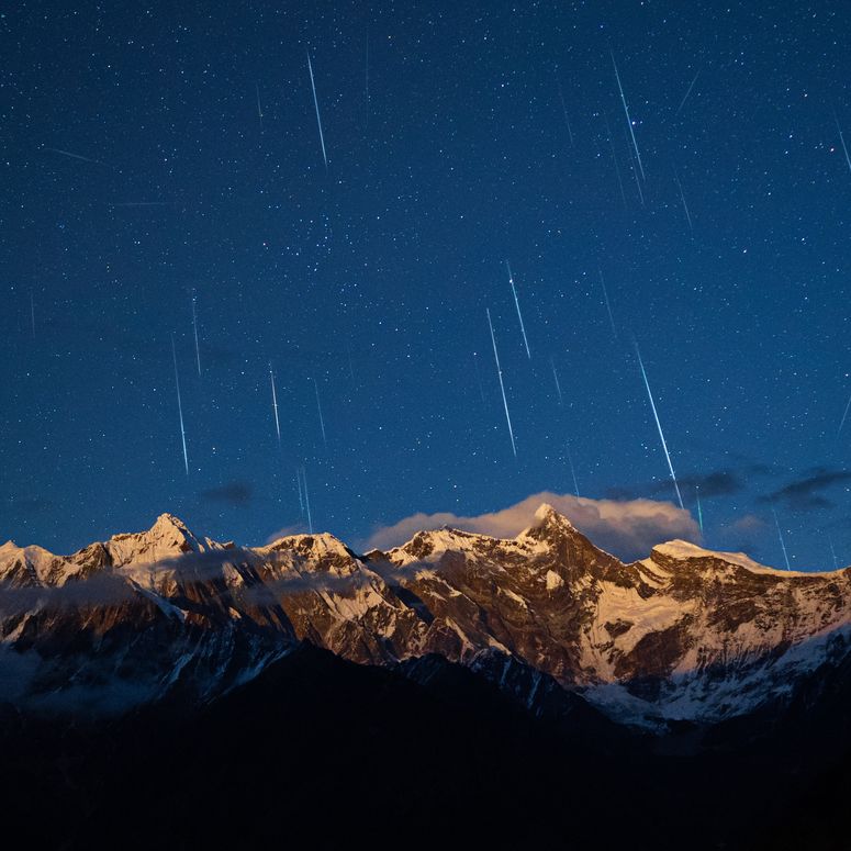 Image may contain: Nature, Night, Outdoors, Starry Sky, Sky, Mountain, Mountain Range, Peak, and Scenery