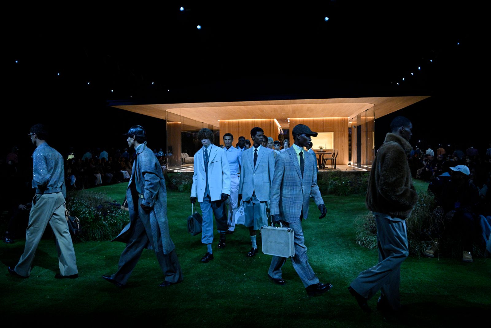 PARIS FRANCE JANUARY 20 Models walk the runway during the Louis Vuitton Menswear FallWinter 20262027 show as part of...
