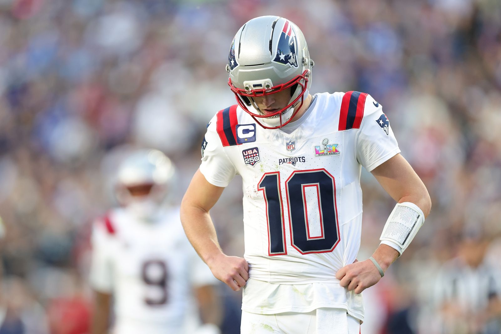 SANTA CLARA CALIFORNIA FEBRUARY 08 Drake Maye 10 of the New England Patriots reacts to a false start during the second...