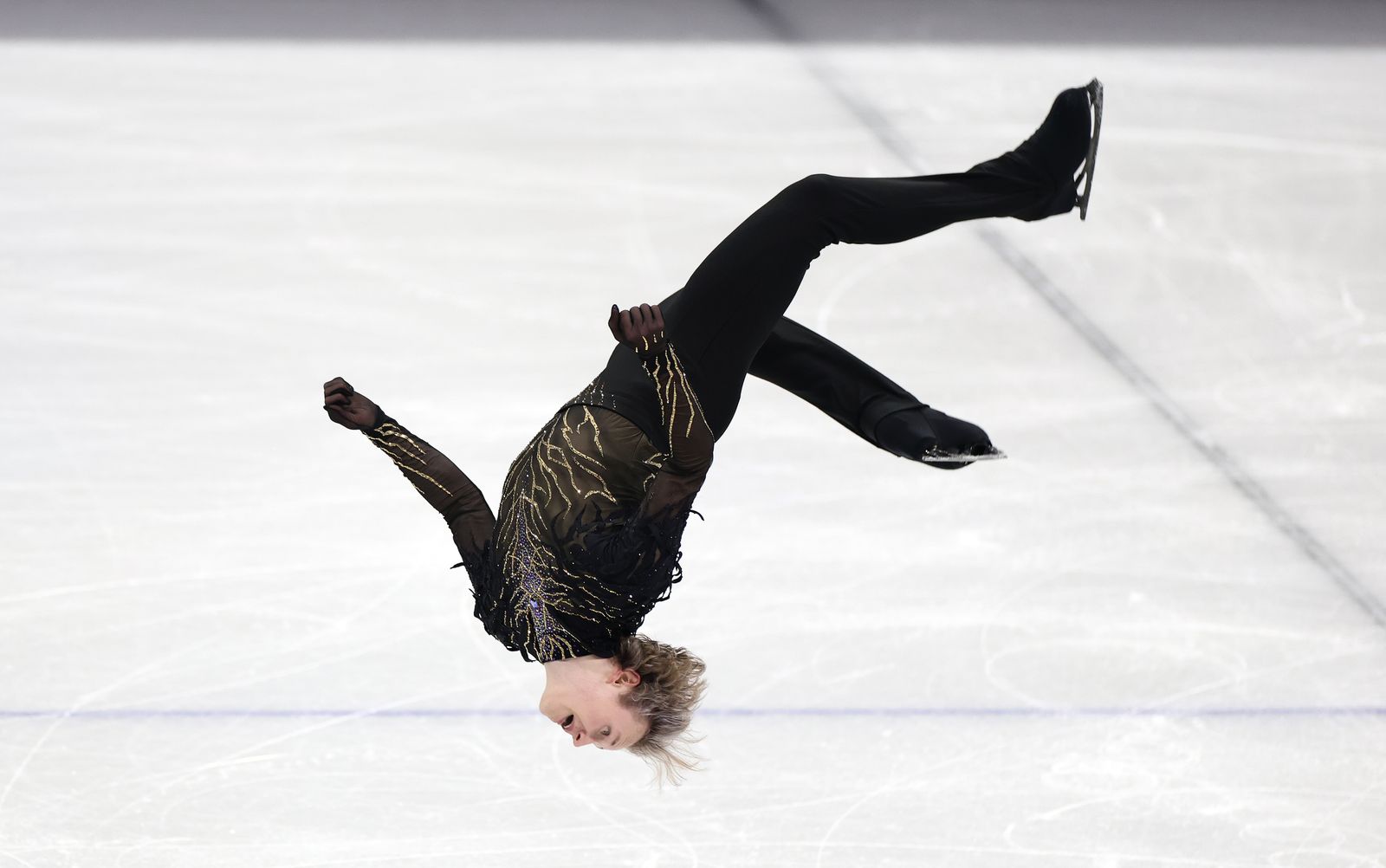 Figure skater Ilia Malinin doing a backflip