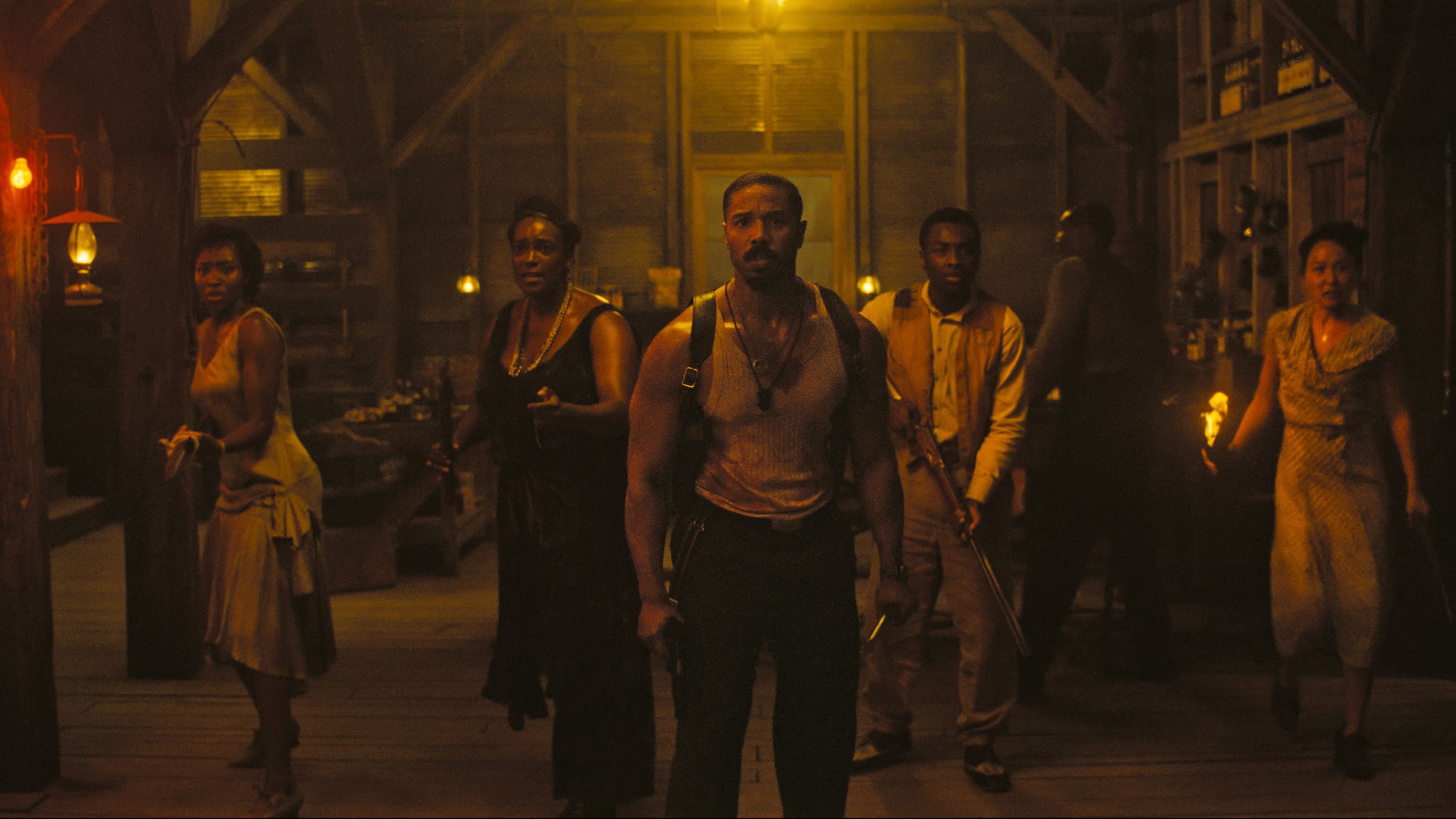 Image may contain Michael B. Jordan Wunmi Mosaku City Road Street Urban Person Walking Adult Face and Head