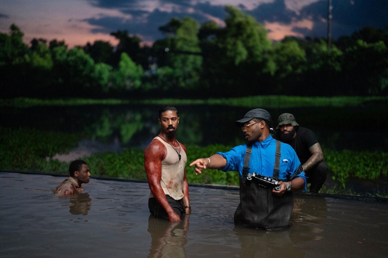 Image may contain Ryan Coogler Michael B. Jordan Adult Person Bathing Clothing and Shorts