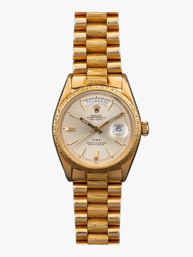 Image may contain Wristwatch Arm Body Part and Person