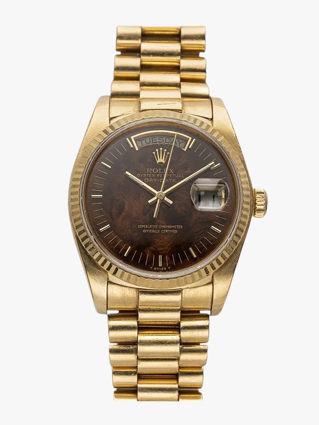 Image may contain Wristwatch Arm Body Part and Person