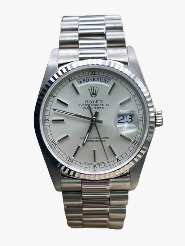 Image may contain Wristwatch Arm Body Part and Person