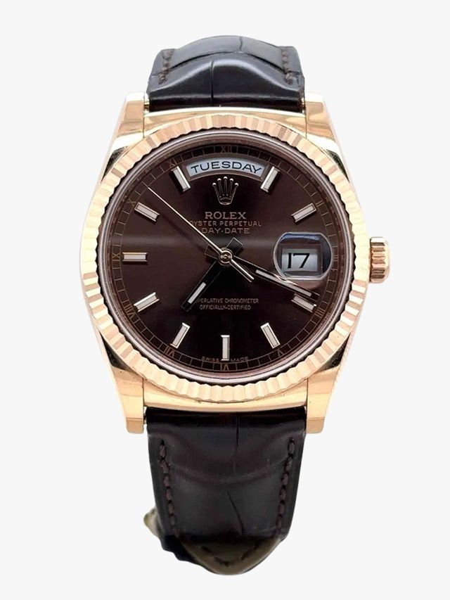 Image may contain Wristwatch Arm Body Part and Person