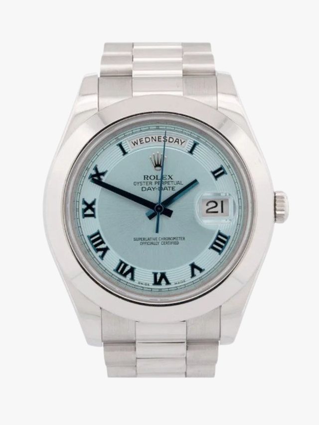Image may contain Wristwatch Arm Body Part and Person