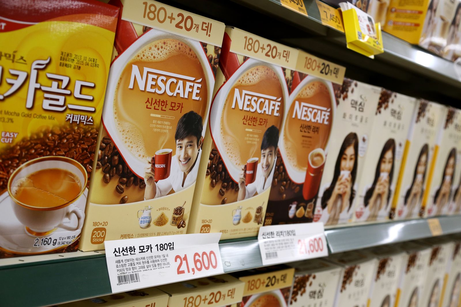 Packages of Nestle SA Nescafe coffee are displayed for sale at an EMart Co. store a subsidiary of Shinsegae Co. in...