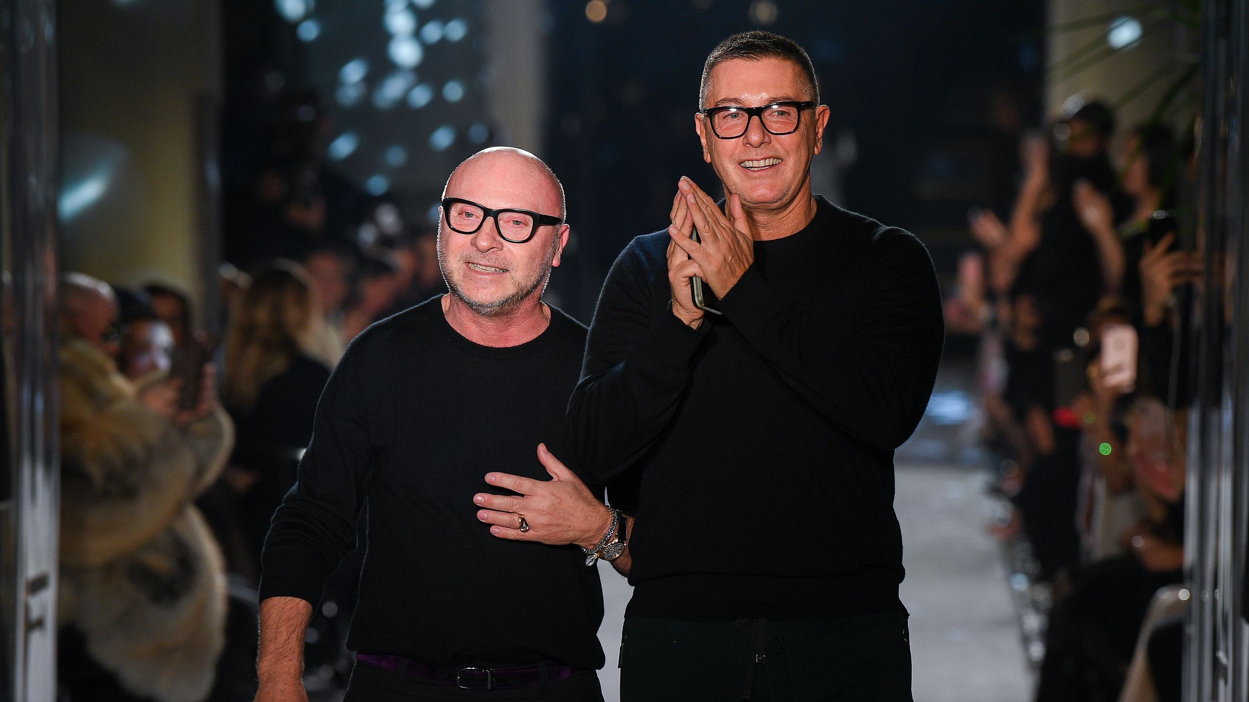 MILAN ITALY FEBRUARY 24 Designer Domenico Dolce and Stefano Gabbana walk the runway at the Dolce Gabbana show during...