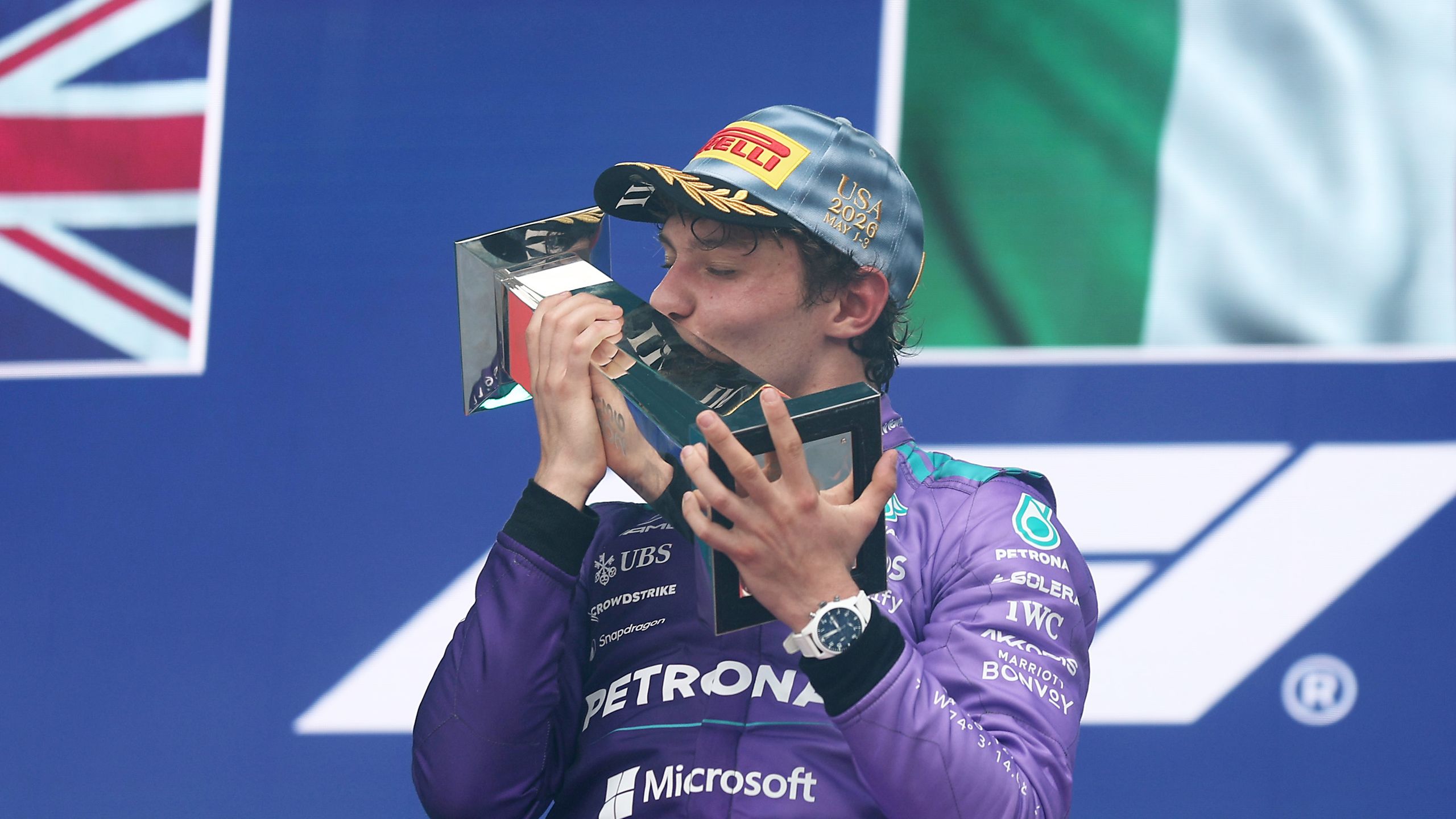 MIAMI FLORIDA MAY 03 Race winner Andrea Kimi Antonelli of Italy and Mercedes AMG Petronas F1 Team kisses his trophy on...
